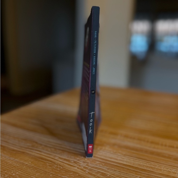 Scholastic Graphic Novel with Dark Purple and Red Cover - Picture 2 of 3